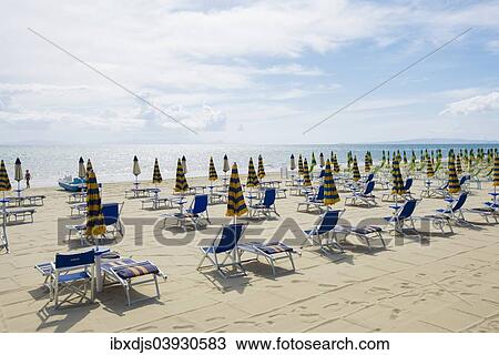 "Deck chairs on the beach, Follonica, Province of Grosseto, Tuscany, Italy, Europe" View Large Photo Image Stock Image - "Deck chairs on the beach, Follonica, Province of Grosseto, Tuscany, Italy, Europe". Fotosearch