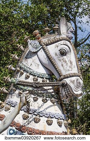 Stock Photo - "Decorated horse statue, temple for the god Madurai Veeran, Mandavi, Tamil Nadu, India, Asia". Fotosearch