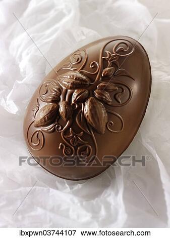 Decorated milk chocolate Easter egg View Large Photo Image Stock Photo - Decorated milk chocolate Easter egg. Fotosearch
