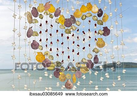 "Decoration, curtain, heart made of shells, view across the sea, Ao Nang Beach, Ao Nang, Krabi Province, Southern Thailand, Thailand, Asia" View Large Photo Image Stock Photo - "Decoration, curtain, heart made of shells, view across the sea, Ao Nang Beach, Ao Nang, Krabi Province, Southern Thailand, Thailand, Asia". Fotosearch
