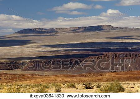 "Desert-like landscape with barren hills in Richtersveld, Ai-Ais Richtersveld Transfrontier Park, Northern Cape, South Africa, Africa" View Large Photo Image Stock Image - "Desert-like landscape with barren hills in Richtersveld, Ai-Ais Richtersveld Transfrontier Park, Northern Cape, South Africa, Africa". Fotosearch