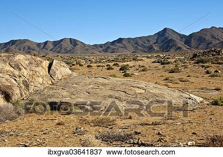 Stock Photo - "Desert-like landscape with barren hills in Richtersveld, Ç€Ai-Ç€Ais Richtersveld Transfrontier Park, Northern Cape, South Africa, Africa". Fotosearch