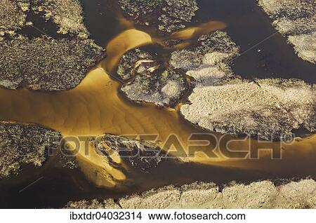 "Detail of a sandy section of the Gomoti River with its channels and islands, aerial view, Okavango Delta, Botswana, Africa" View Large Photo Image Picture - "Detail of a sandy section of the Gomoti River with its channels and islands, aerial view, Okavango Delta, Botswana, Africa". Fotosearch