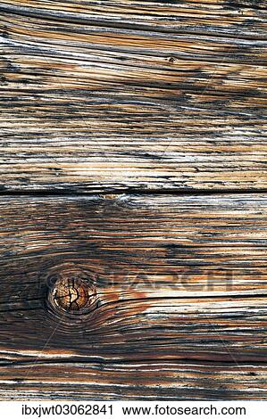 Detail of an old natural wood house front View Large Photo Image Stock Image - Detail of an old natural wood house front. Fotosearch
