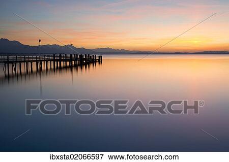 "Dock in the evening light near Chieming on Lake Chiemsee, Bavaria, Germany, Europe, PublicGround, Europe" View Large Photo Image Stock Photo - "Dock in the evening light near Chieming on Lake Chiemsee, Bavaria, Germany, Europe, PublicGround, Europe". Fotosearch