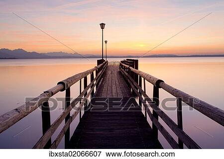 "Dock in the evening light near Chieming on Lake Chiemsee, Bavaria, Germany, Europe, PublicGround, Europe" View Large Photo Image Stock Photo - "Dock in the evening light near Chieming on Lake Chiemsee, Bavaria, Germany, Europe, PublicGround, Europe". Fotosearch
