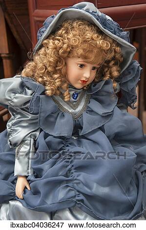 "Doll with blond curly hair, Auer Dult, Munich, Upper Bavaria, Bavaria, Germany, Europe" View Large Photo Image Stock Photo - "Doll with blond curly hair, Auer Dult, Munich, Upper Bavaria, Bavaria, Germany, Europe". Fotosearch