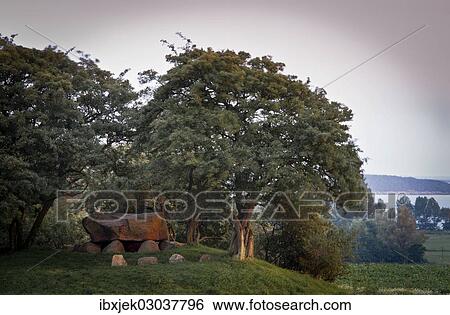 Stock Photograph - "Dolmen, salt lagoon at back, Rerik, Mecklenburg-Western Pomerania, Germany, Europe". Fotosearch