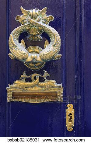 "Door knocker in the form of fish on the front door of a house, Valletta, Malta, Europe" View Large Photo Image Stock Image - "Door knocker in the form of fish on the front door of a house, Valletta, Malta, Europe". Fotosearch