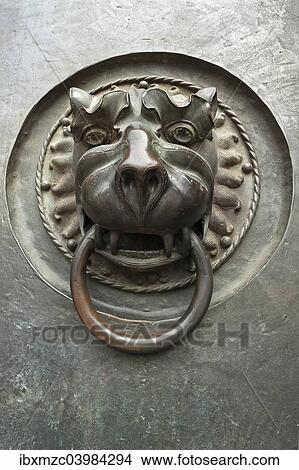 "Door knocker with a lion's head, 14th century, main entrance to St Lorenz Church, Nuremberg, Middle Franconia, Bavaria, Germany, Europe" View Large Photo Image Picture - "Door knocker with a lion's head, 14th century, main entrance to St Lorenz Church, Nuremberg, Middle Franconia, Bavaria, Germany, Europe". Fotosearch