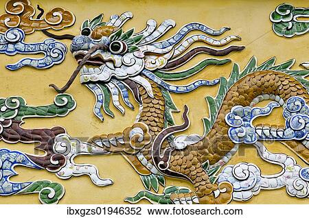 "Dragon figure made of porcelain fragments on a yellow wall, Hoang Thanh Imperial Palace, Forbidden City, Hue, UNESCO World Heritage Site, Vietnam, Asia" View Large Photo Image Stock Image - "Dragon figure made of porcelain fragments on a yellow wall, Hoang Thanh Imperial Palace, Forbidden City, Hue, UNESCO World Heritage Site, Vietnam, Asia". Fotosearch