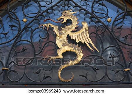 "Dragon figure over the entrance of the town hall, Murnau, Upper Bavaria, Bavaria, Germany, Europe" View Large Photo Image Stock Image - "Dragon figure over the entrance of the town hall, Murnau, Upper Bavaria, Bavaria, Germany, Europe". Fotosearch