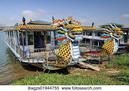 "Dragon head and excursion boat, Song Huong or Huong Giang or Perfume River, near Hue, North Vietnam, Vietnam, Southeast Asia, Asia" View Large Photo Image Stock Photography - "Dragon head and excursion boat, Song Huong or Huong Giang or Perfume River, near Hue, North Vietnam, Vietnam, Southeast Asia, Asia". Fotosearch