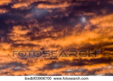 Dramatic clouds at sunrise View Large Photo Image Stock Image - Dramatic clouds at sunrise. Fotosearch
