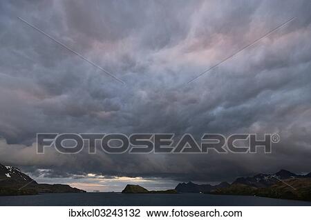 "Dramatic clouds at sunset, Stromness Harbour, Stromness Bay, South Georgia and the South Sandwich Islands, United Kingdom, Antarctica" View Large Photo Image Stock Image - "Dramatic clouds at sunset, Stromness Harbour, Stromness Bay, South Georgia and the South Sandwich Islands, United Kingdom, Antarctica". Fotosearch