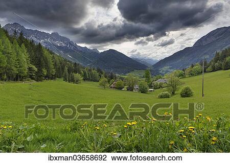Stock Image - "Dramatic clouds over the alpine landscape, Schaidasattel pass, Schaidasattel pass, Karawanks, Zell-Schaida, Carinthia, Austria, Europe". Fotosearch