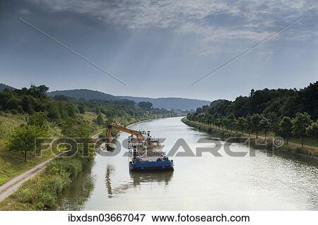 "Dredger on the Main-Danube Canal, Altmuhltal, Bavaria, Germany, Europe" View Large Photo Image Stock Photo - "Dredger on the Main-Danube Canal, Altmuhltal, Bavaria, Germany, Europe". Fotosearch