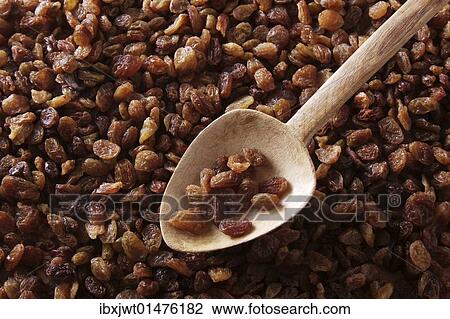 "Dried raisins, sultanas, Thompson Seedless, with an old wooden spoon" View Large Photo Image Stock Image - "Dried raisins, sultanas, Thompson Seedless, with an old wooden spoon". Fotosearch