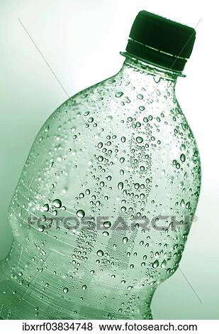 Drops of water on a plastic bottle View Large Photo Image Stock Photo - Drops of water on a plastic bottle. Fotosearch