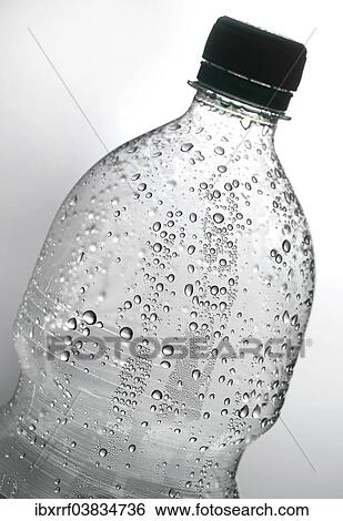 Drops of water on a plastic bottle View Large Photo Image Stock Photograph - Drops of water on a plastic bottle. Fotosearch