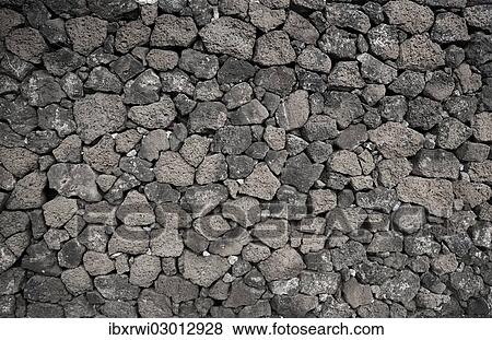 "Dry wall constructed from individually stacked lava rocks, typical feature of Lanzarote, Lanzarote, Canary Islands, Spain, Europe" View Large Photo Image Stock Photo - "Dry wall constructed from individually stacked lava rocks, typical feature of Lanzarote, Lanzarote, Canary Islands, Spain, Europe". Fotosearch
