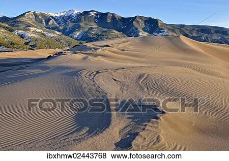 "Dune landscape in front of the Sangre de Cristo Mountains, Great Sand Dunes National Park, Mosca, Colorado, USA" View Large Photo Image Stock Photo - "Dune landscape in front of the Sangre de Cristo Mountains, Great Sand Dunes National Park, Mosca, Colorado, USA". Fotosearch