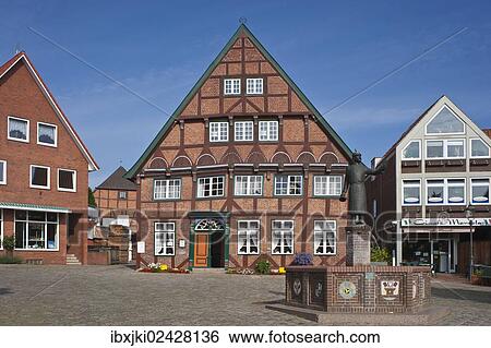 "Dyers' house with market fountain and a monument to Hein Lueth, Luetjenburg, Schleswig-Holstein, Germany, Europe" View Large Photo Image Stock Photograph - "Dyers' house with market fountain and a monument to Hein Lueth, Luetjenburg, Schleswig-Holstein, Germany, Europe". Fotosearch