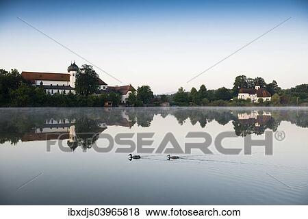 "Early morning at Seeon Abbey on an island in Seeoner See Lake, Seeon-Seebruck, Chiemgau, Upper Bavaria, Bavaria, Germany, Europe" View Large Photo Image Stock Photo - "Early morning at Seeon Abbey on an island in Seeoner See Lake, Seeon-Seebruck, Chiemgau, Upper Bavaria, Bavaria, Germany, Europe". Fotosearch