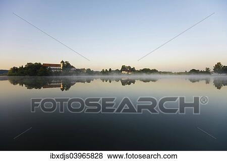 "Early morning at Seeon Abbey on an island in Seeoner See Lake, Seeon-Seebruck, Chiemgau, Upper Bavaria, Bavaria, Germany, Europe" View Large Photo Image Stock Photo - "Early morning at Seeon Abbey on an island in Seeoner See Lake, Seeon-Seebruck, Chiemgau, Upper Bavaria, Bavaria, Germany, Europe". Fotosearch