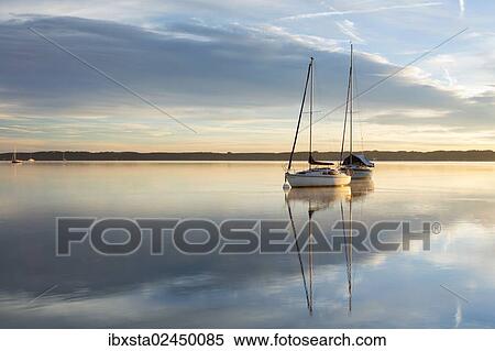 "Early morning, boats on Lake Starnberg near Tutzing, Bavaria, Germany, Europe, PublicGround, Europe" View Large Photo Image Stock Photography - "Early morning, boats on Lake Starnberg near Tutzing, Bavaria, Germany, Europe, PublicGround, Europe". Fotosearch
