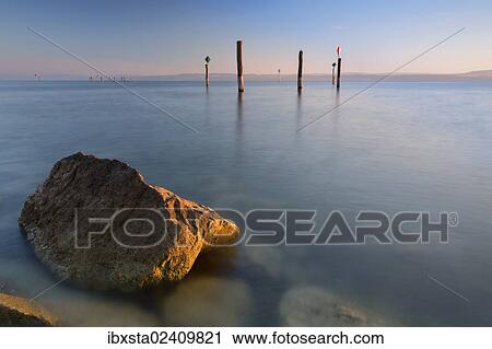 "Early morning mood in the port of Guettingen, Lake Constance, Switzerland, Europe, PublicGround, Europe" View Large Photo Image Stock Image - "Early morning mood in the port of Guettingen, Lake Constance, Switzerland, Europe, PublicGround, Europe". Fotosearch