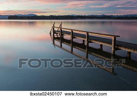 "Early morning mood, jetty at Lake Starnberg near Tutzing, Bavaria, Germany, Europe, PublicGround, Europe" View Large Photo Image Stock Photo - "Early morning mood, jetty at Lake Starnberg near Tutzing, Bavaria, Germany, Europe, PublicGround, Europe". Fotosearch