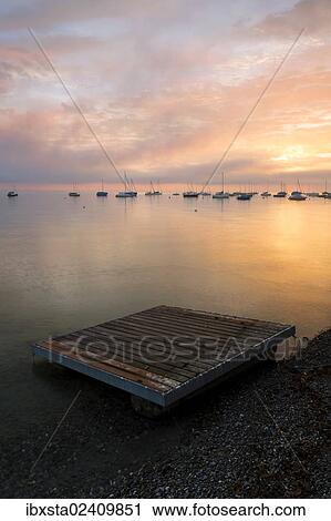 Stock Image - "Early morning mood on Lake Constance near Landschlacht, Switzerland, Europe, PublicGround, Europe". Fotosearch
