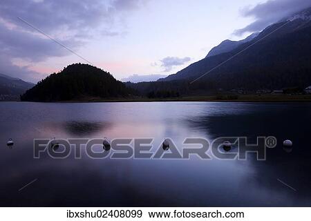 Stock Photo - "Early morning on Lake Champferersee, St. Moritz, Engadin, canton of Grisons, Switzerland, Europe". Fotosearch
