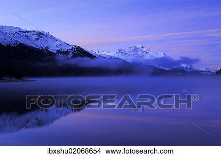 "Early morning on Lake Silvaplana, Mt Piz da la Margna at back, St. Moritz, Engadine, Grisons, Switzerland, Europe" View Large Photo Image Picture - "Early morning on Lake Silvaplana, Mt Piz da la Margna at back, St. Moritz, Engadine, Grisons, Switzerland, Europe". Fotosearch