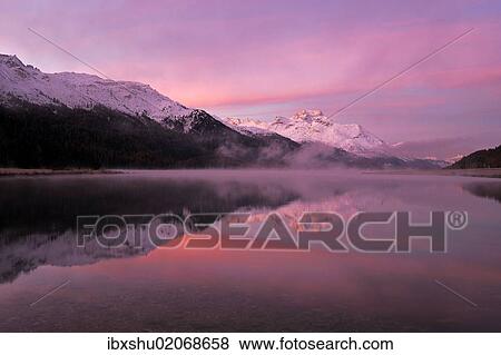 "Early morning on Lake Silvaplana, Mt Piz da la Margna at back, St. Moritz, Engadine, Grisons, Switzerland, Europe" View Large Photo Image Stock Photo - "Early morning on Lake Silvaplana, Mt Piz da la Margna at back, St. Moritz, Engadine, Grisons, Switzerland, Europe". Fotosearch