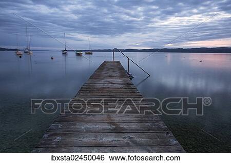 "Early morning view of jetty, Lake Starnberg at Seeshaupt, Bavaria, Germany, Europe, PublicGround, Europe" View Large Photo Image Stock Photograph - "Early morning view of jetty, Lake Starnberg at Seeshaupt, Bavaria, Germany, Europe, PublicGround, Europe". Fotosearch