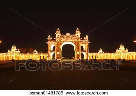 Stock Photograph - "East Gate of the Maharaja's Palace Mysore Palace, Sunday illumination with incandescent lamps, Mysore, Karnataka, South India, India, South Asia, Asia". Fotosearch