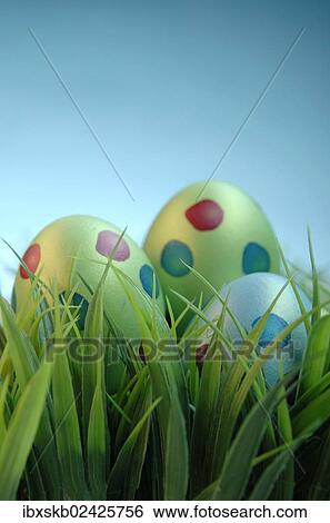 Easter eggs on a lawn View Large Photo Image Stock Photograph - Easter eggs on a lawn. Fotosearch
