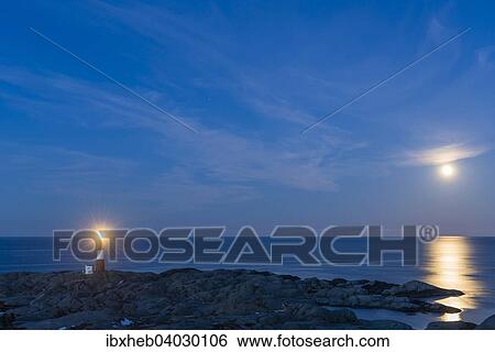 Stock Photograph - "Egeroy Fyr with full moon, near Egersund, Rogaland, Norway, Europe". Fotosearch