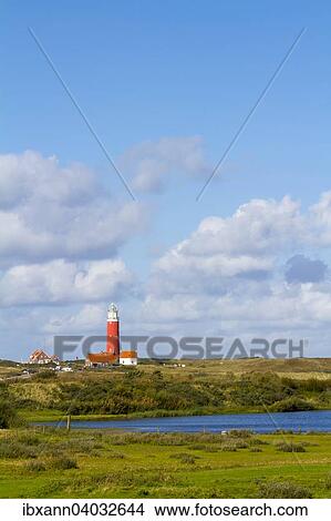 "Eierland Lighthouse with dunes, De Cocksdorp, Texel, West Frisian Islands, North Holland, Holland, The Netherlands, Europe" View Large Photo Image Picture - "Eierland Lighthouse with dunes, De Cocksdorp, Texel, West Frisian Islands, North Holland, Holland, The Netherlands, Europe". Fotosearch