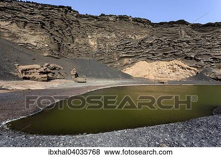"El Golfo volcano crater, Charco de los Clicos crater lake, Lanzarote, Canary Islands, Spain, Europe" View Large Photo Image Stock Photo - "El Golfo volcano crater, Charco de los Clicos crater lake, Lanzarote, Canary Islands, Spain, Europe". Fotosearch
