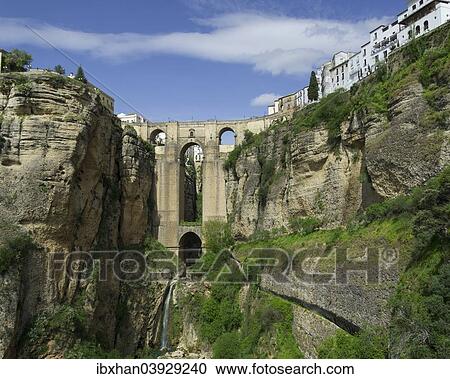 Stock Image - "El Tajo Canyon and El Puente Nuevo bridge, Ronda, Malaga province, Andalucia, Spain, Europe". Fotosearch
