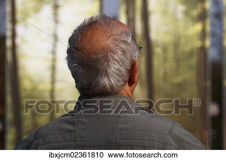 Stock Image - "Elderly man, head seen from behind". Fotosearch