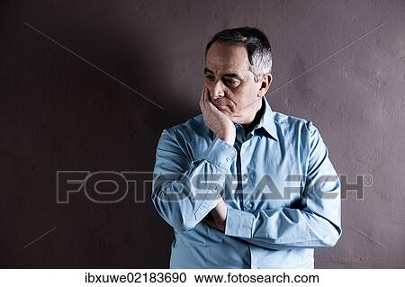 Elderly man with a pensive expression View Large Photo Image Stock Image - Elderly man with a pensive expression. Fotosearch