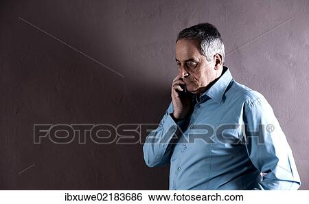 Elderly man with a pensive expression View Large Photo Image Stock Photograph - Elderly man with a pensive expression. Fotosearch