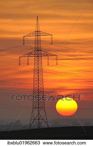 "Electric power transmission lines, electricity pylon, with the setting sun, Beinstein near Stuttgart, Baden-Wuerttemberg, Germany, Europe" View Large Photo Image Stock Image - "Electric power transmission lines, electricity pylon, with the setting sun, Beinstein near Stuttgart, Baden-Wuerttemberg, Germany, Europe". Fotosearch