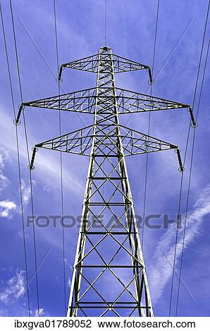 Electricity pylon against a blue sky View Large Photo Image Stock Image - Electricity pylon against a blue sky. Fotosearch