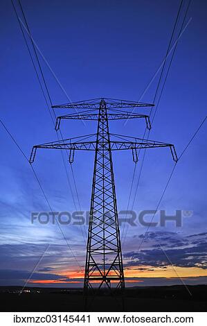 "Electricity pylon against a blue evening sky, Eckental, Middle Franconia, Bavaria, Germany, Europe" View Large Photo Image Stock Image - "Electricity pylon against a blue evening sky, Eckental, Middle Franconia, Bavaria, Germany, Europe". Fotosearch