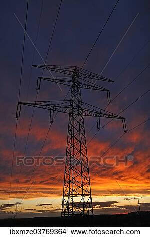"Electricity pylon against a red evening sky, Bavaria, Germany, Europe" View Large Photo Image Picture - "Electricity pylon against a red evening sky, Bavaria, Germany, Europe". Fotosearch